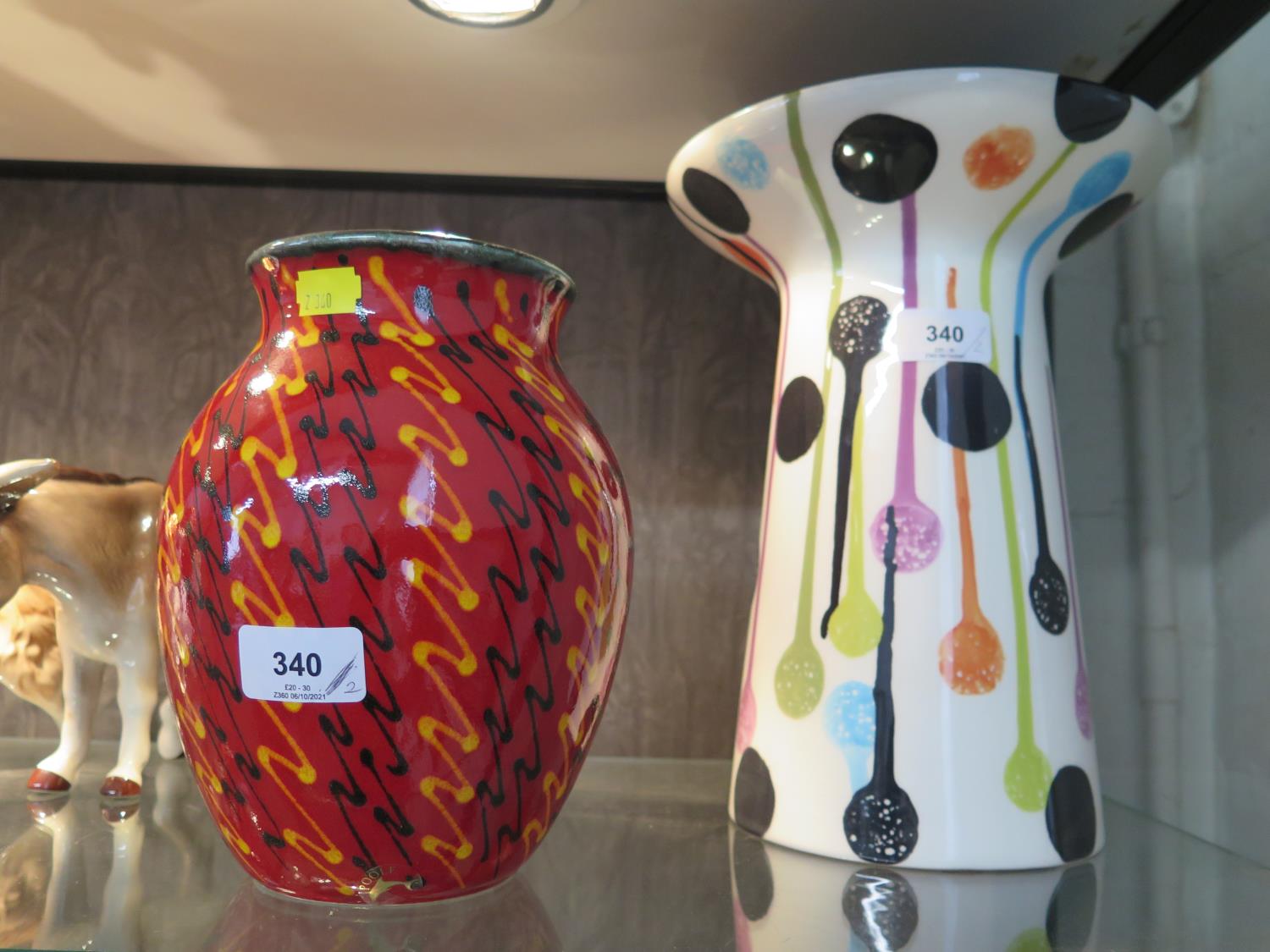 A Poole Pottery Strobe design vase, 21 cm high, and another large tapering vase (2)