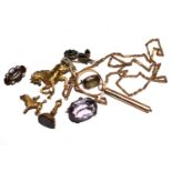 A collection of gold jewellery to include an 18 carat gold diamond set horse brooch and a hair