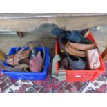 Various leather revolver holsters and belts, two military style belts and two leather bags