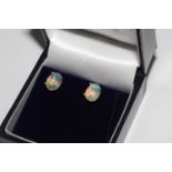 Pair Ethiopian opal studs, in silver