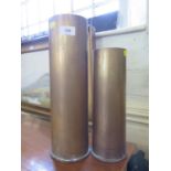 Two World War II brass shell cases, 12cm diameter x 37 cm high and 10.5 cm diameter x 29 cm high (2)