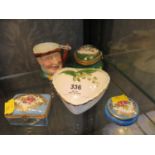 Three French porcelain trinket boxes, one depicting Napoleon, a Widdicombe Fair character jug, and a
