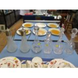 A pair of pressed glass claret jugs, a square decanter and three other decanters (6)