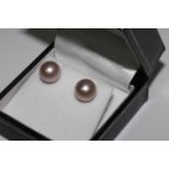 Pair of 9ct yellow gold pink freshwater pearl studs, boxed