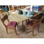 A 1950s G-Plan 'Brandon' range teak dining room suite, comprising a drop leaf table with four dining