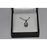 18ct white gold four claw round brilliant cut diamond pendant on a white gold chain. 1.24ct. Boxed