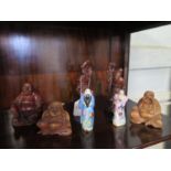 Two Chinese figures of Shou Lao and crane together with three laughing Buddha and two famille rose