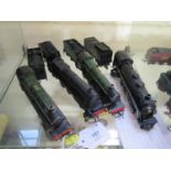 Four locomotives and tenders, Tri-ang black pacific HIAWATHA TR2355 with lights and smoke, Tri-ang