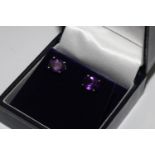 Pair oval amethyst studs, set in silver
