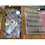 A collection of detector find coins in pods, in a wooden and plastic case