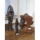 A pair of African carved wood busts, 30 cm high and three other African figural carvings (5)