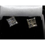 An 18ct yellow and white gold invisible set 4 x princess cut screw back studs. 2.00ct total. Boxed