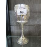A Victorian sterling silver goblet. George Unite, Birmingham 1881, embossed with glowers and