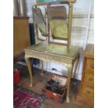 A George I style gilt wood dressing table, the triptych mirror over a foliate scroll decorated top