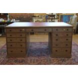 A Victorian Oak Partners Desk. Circa 1900. With leather inset top. Fitted with drawers and two