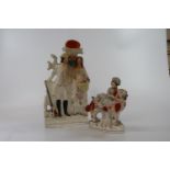 Two Staffordshire figure groups 24cm and 42cm (2)