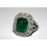 18ct white gold emerald double halo ring with diamond shoulders. E 4.87ct. D 1.66ct. Size K