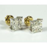 An 18ct yellow and white gold invisible set 4 x princess cut screw back studs. 2.00ct total. Boxed