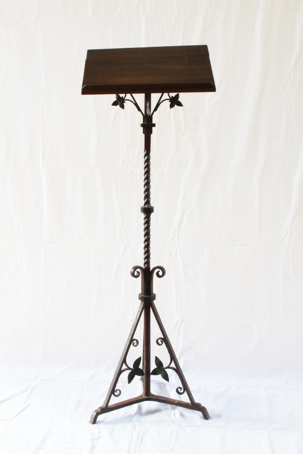 A Wrought Iron Music stand. Circa 1890. 141cm high.