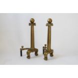 A Pair of George III Brass Fire dogs. Of large proportions. 91cm x 46cm