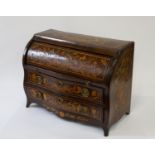 A Miniature Mahogany Marquetry Inlaid Bombe Cylinder Desk. Circa 1860. With a pull slide opening