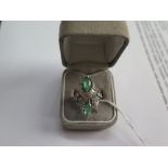 Diamond and emerald dress ring, baguette and brilliant cut diamonds, 9.89g, size M