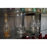 Clear glass chalice with bucket-bowl 33cm, two ewers 19cm and two decanters 33cm (5)