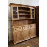 A Modern Pine Dresser. Of typical form. 195cm x 150cm x 42cm