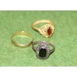 A 9 carat gold wedding ring, a Middle Eastern ring and a marcasite ring