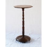 A Victorian Wine Table. Second half of the 19th century. With an Octagonal top above a turned