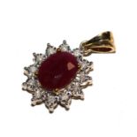 9ct yellow gold oval ruby and diamond cluster pendant. D 0.12ct
