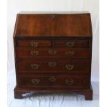 A George Mahogany Bureau. Circa 1780. Oy typical form. The fall front opening to reveal a fitted