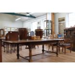 An Oak Late Victorian Dining Table. Circa 1900, Fitted with two extra leaves. 77cm x 236cm x 113cm.