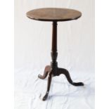 A George III Oak Tripod Table. Second half of the 18th century. 69cm x 48cm diameter