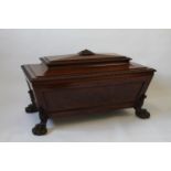 A Massive William IV Mahogany Lead lined Cellarette, The hinge cover carved with gadroon and egg and