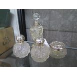 Three Sterling Silver Topped Dressing Table jars and a Scent Bottle. Various dates, makers and