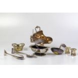 A collection of eight pieces of silver plate, including a pair of salt and peppers, a condiment