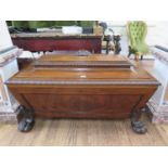 A Massive William IV Mahogany Lead lined Cellarette, The hinge cover carved with gadroon and egg and