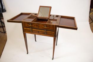 A Sheraton Period Lady's Dressing Table. In manner of Ince and Mayhew. Circa 1790. The two hinged