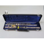 A Boosey and Hawkes Emperor Flute. Fitted case.