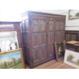 An Arts and Crafts Oak Italian Renaissance Revival Bedroom Suite. Circa 1880. Comprising a triple