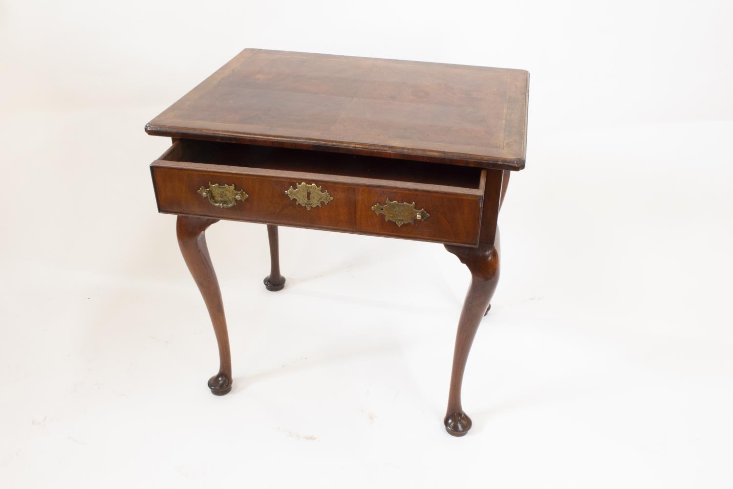 A George II Irish Walnut Side Table. Circa 1740. Fitted with a single frieze drawer. On cabriole