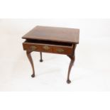 A George II Irish Walnut Side Table. Circa 1740. Fitted with a single frieze drawer. On cabriole