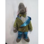 A Roland Rat Children's Toy. Shown wearing evening dress.