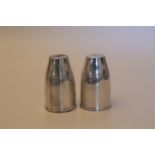 A Pair of Modern Sterling Silver Condiments. London 2001. Each in the form of an Artillery Shell.