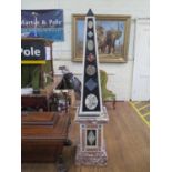 A Pair of Marble Garden Obelisks. 20th century. Each with specimen marble inlay. 185cm high. Some