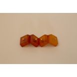 A pair of amber cufflinks