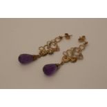 A pair of amethyst earrings stone set