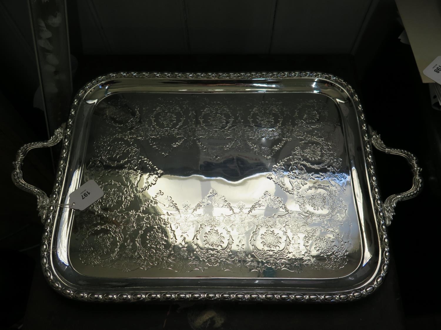 A Mappin & Webb silver plated two-handled tray with brightmark decoration to centre 66cm