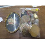 A collection of compacts, small trinket boxes, a Halcyon Days enamel box, a brooch and a framed oval